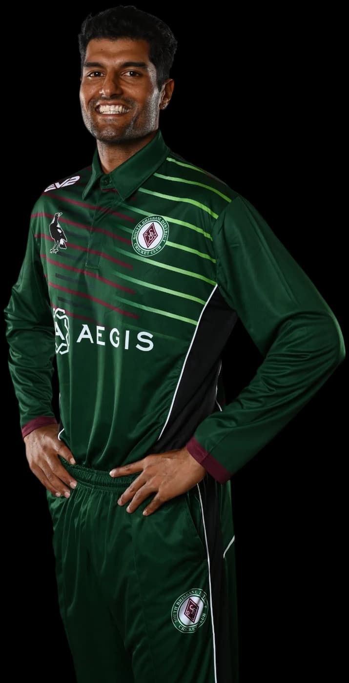 A Magpies player standing with a hand on their hip